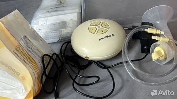 Электрический молокоотсос medela