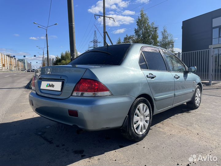 Mitsubishi Lancer 1.6 МТ, 2006, 206 780 км