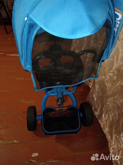 Трехколесный велосипед с ручкой