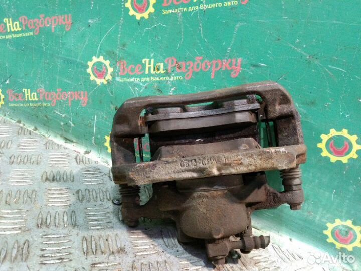 Суппорт передний левый Chevrolet Aveo T300 седан