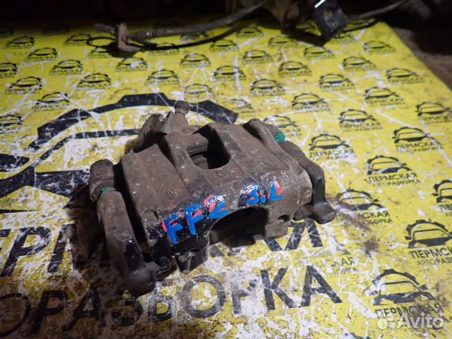 Суппорт тормозной задний левый для Ford Focus II