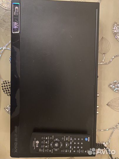 DVD плеер с караоке LG