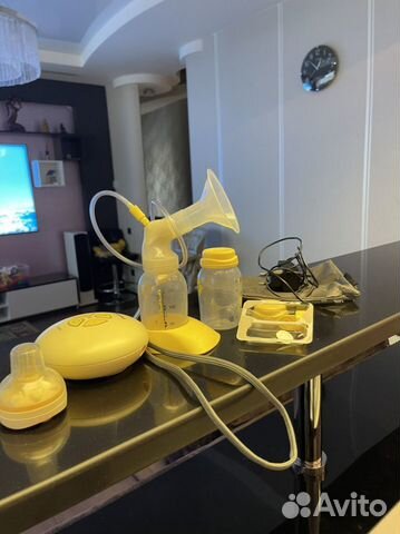 Молокоотсос medela электрический