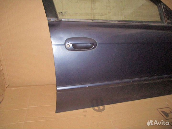 Дверь передняя правая Kia Spectra