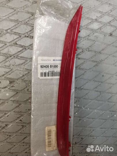 Отражатель заднего бампера левый genesis