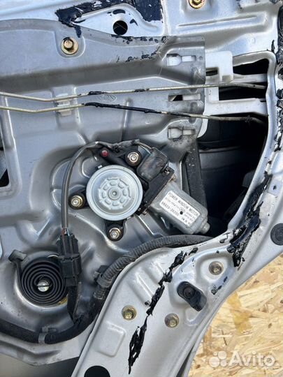 Моторчик стеклоподъемника Hyundai Santa Fe