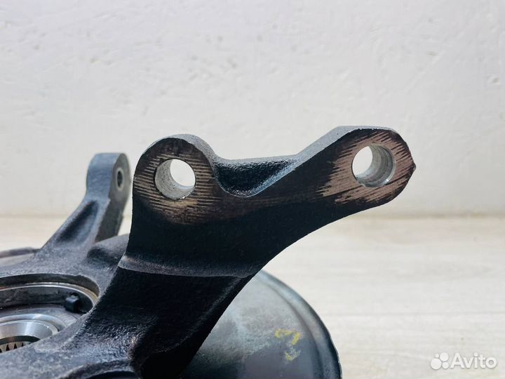 Кулак передний левый Mitsubishi Lancer 10