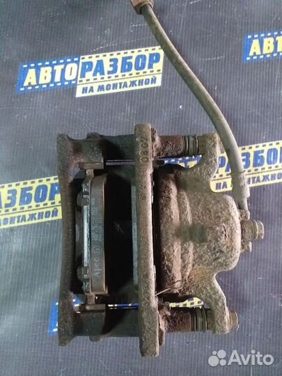 Суппорт тормозной передний левый Хонда Цивик 8 5D