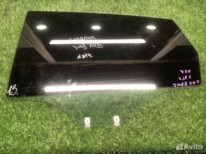 Стекло двери задней левой Hyundai Solaris