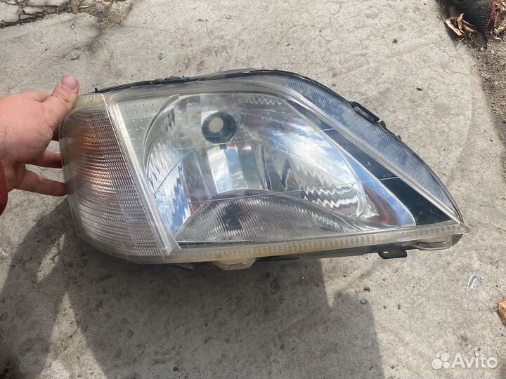 Логан 1 фаза правая фара