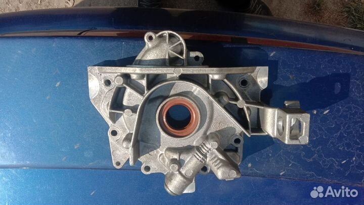 Крышка масленного насоса