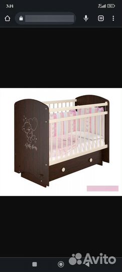 Детская кроватка с маятником и ящиком