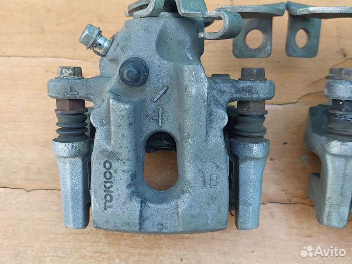 Суппорт тормозной задний тойота королла 150