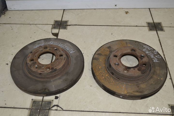 Тормозной диск передний Nissan Almera G15