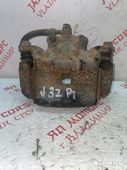 Суппорт тормозной передний правый Nissan Teana