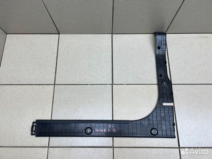 Обшивка багажника задняя левая Hyundai Solaris