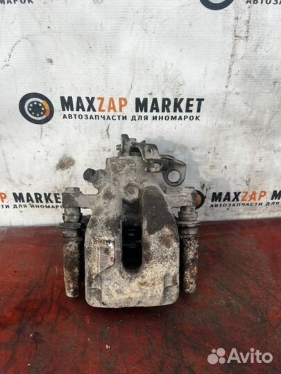 Суппорт тормозной задн. лев. Peugeot 308 2008