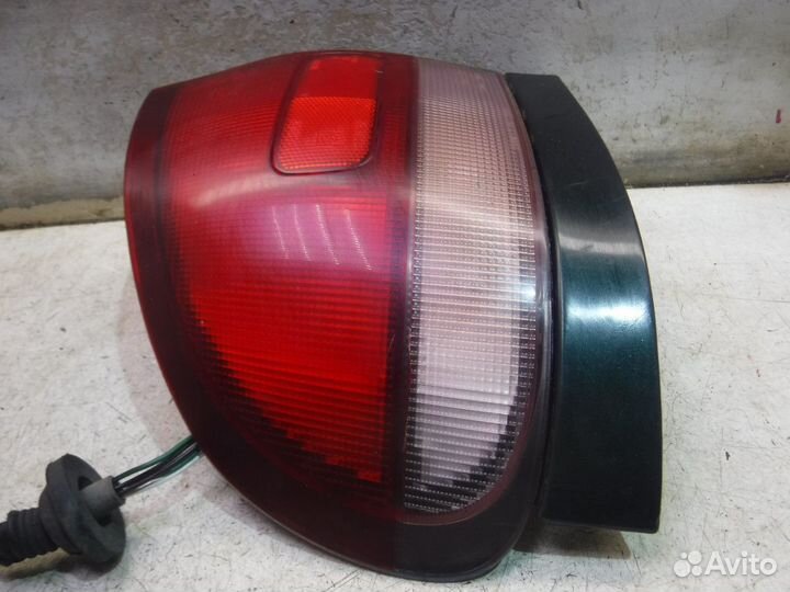 Фонарь задний левый Mazda 626 GE