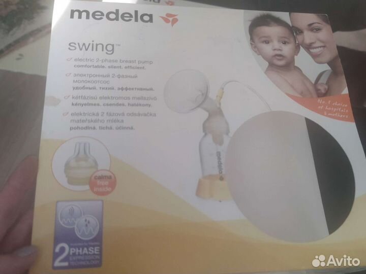 Молокоотсос medela электрический