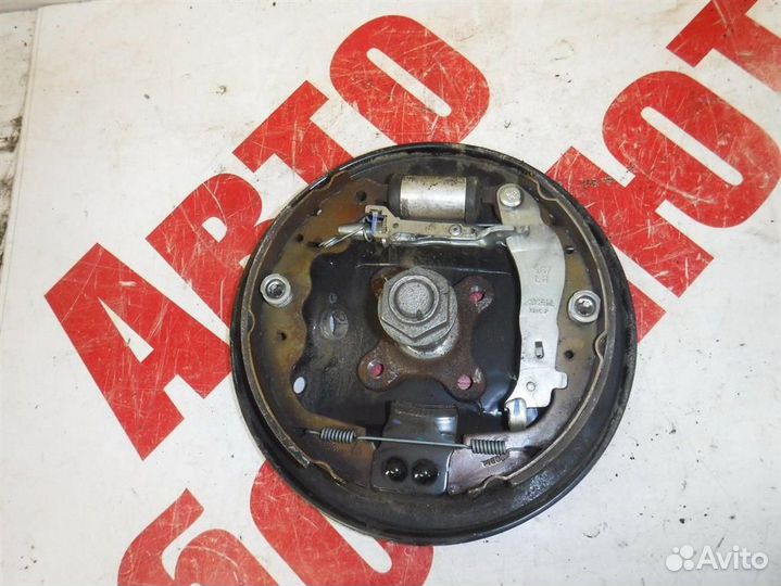 Щит опорный задний левый Nissan Almera (G15) 2013