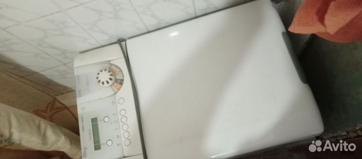 Стиральная машина с вертикальной загрузкой