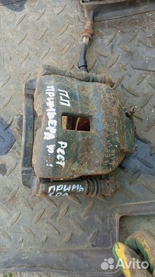 Суппорт передний nissan primera p11