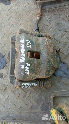 Суппорт передний nissan primera p11