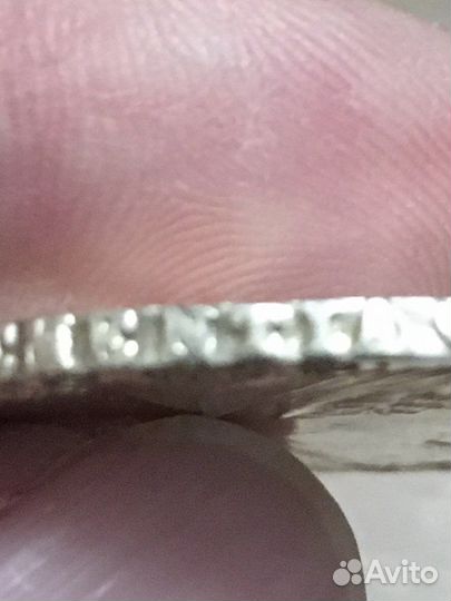 Монета серебряная