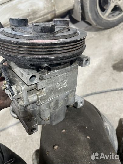 Компрессор кондиционера mazda family