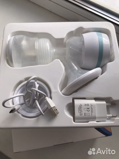 Молокоотсос электрический новый