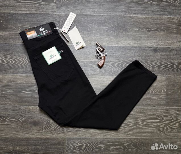 Джинсы Lacoste