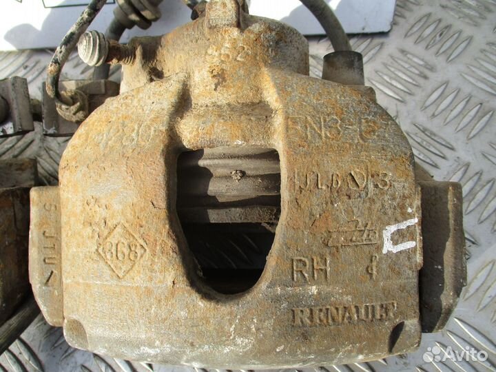 Суппорт тормозной перед.правый Renault Laguna 2