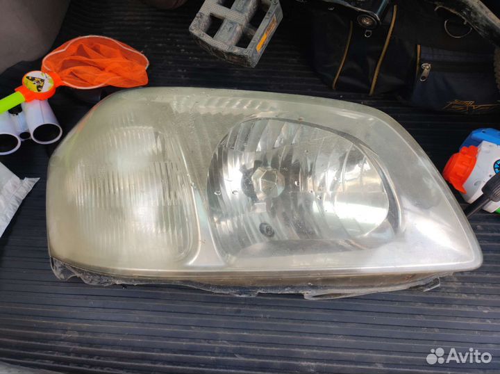 Фара на Мазда Tribute