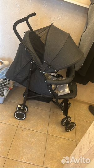 Прогулочная коляска трость
