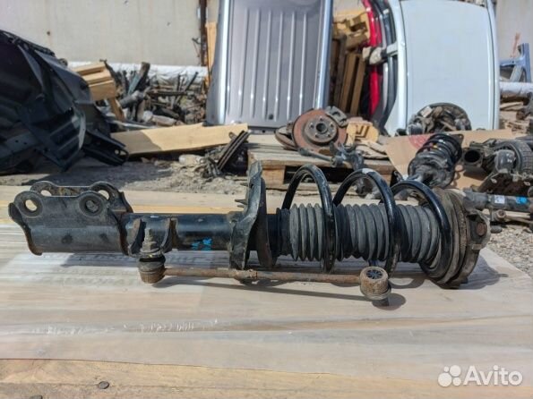 Kia Sportage 4 стойка амортизатора в сборе