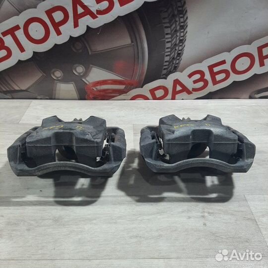 Суппорт тормозной передний Chevrolet Cruze седан