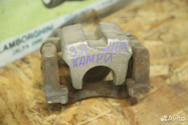 Суппорт тормозной зад Тойота Камри 40