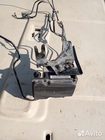 Блок ABS Nissan Note E11