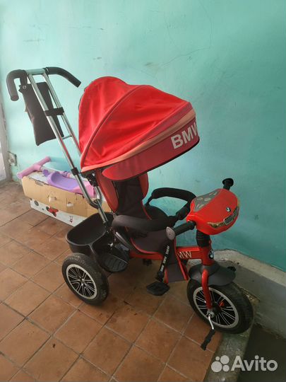 Трёхколёсный велосипед bmw красный