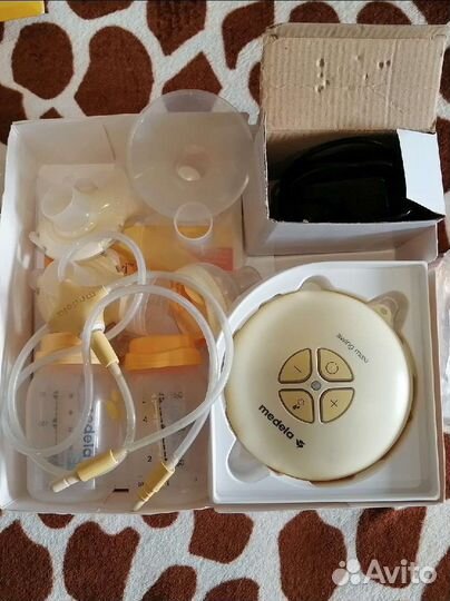 Молокоотсос medela swing электрический