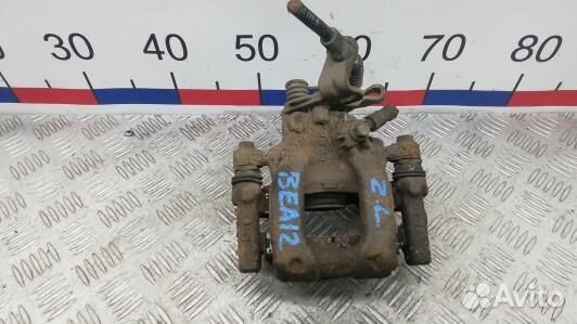 Суппорт тормозной задний левый skoda superb 2 (BEA