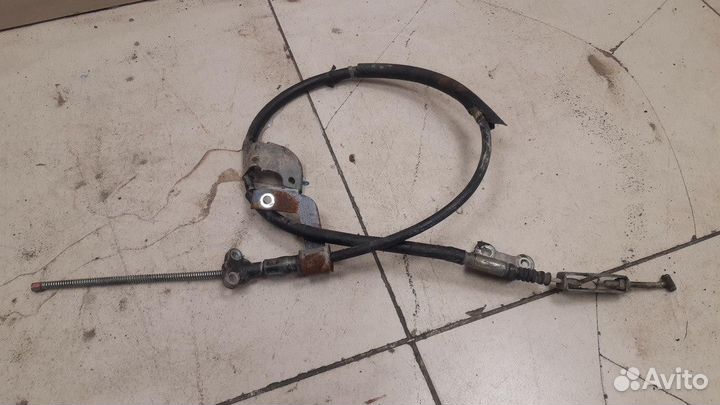 Трос стояночного тормоза левый Toyota Hilux