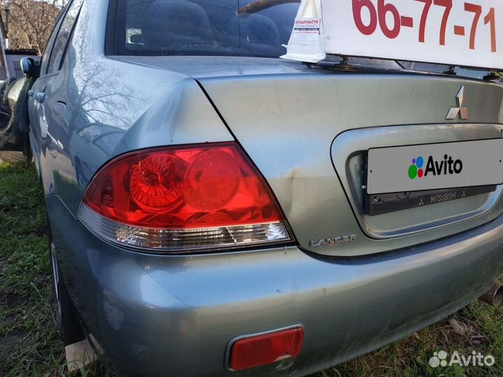 Зеркало правое Mitsubishi Lancer