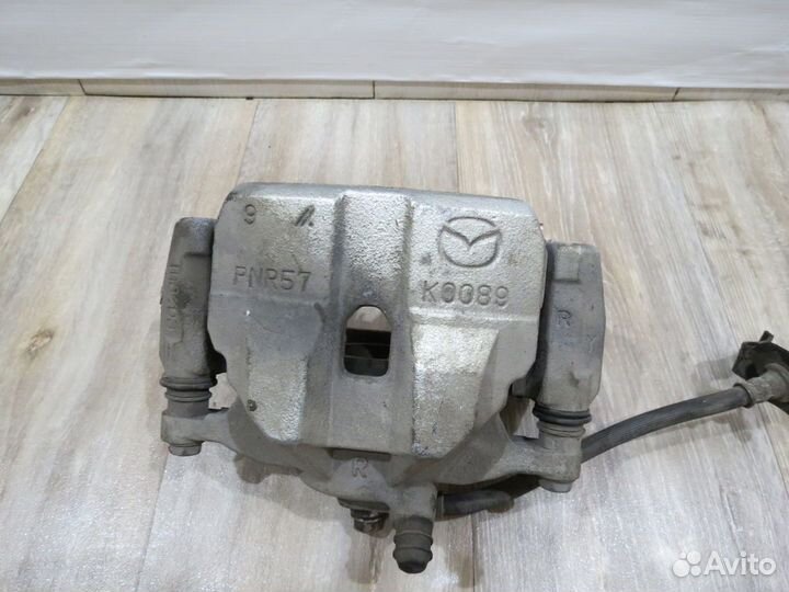 Суппорт тормозной передний правый Mazda 6 GJ