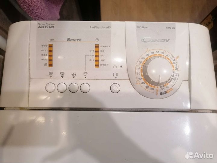 Стиральная машина Candy с вертикальной загрузкой