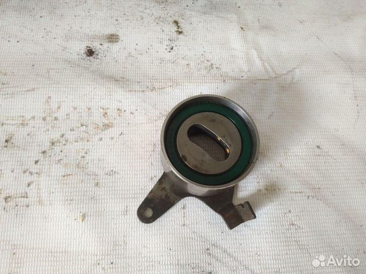 Ролик-натяжитель грм Kia Shuma