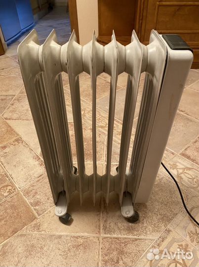Масляный обогреватель (радиатор). Италия