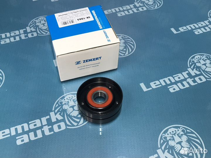 Ролик-натяжитель ручейкового ремня Opel Astra