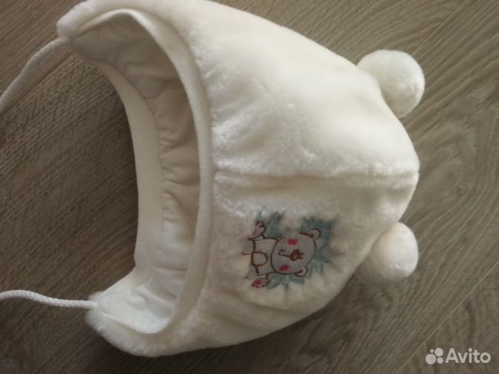 Зимняя меховая шапка на новорожденного