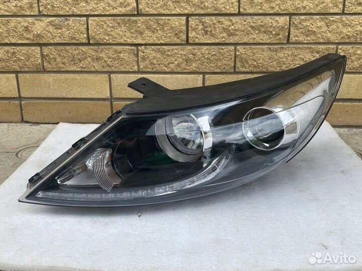 Фара ксенон левая KIA Sportage 3 дхо LED